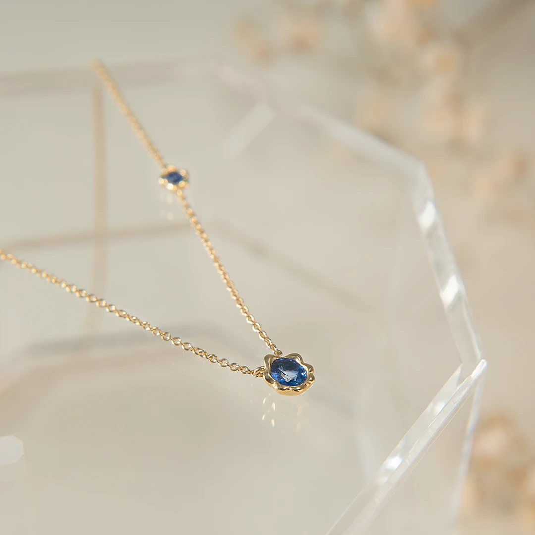 Melted gold blue sapphire necklace